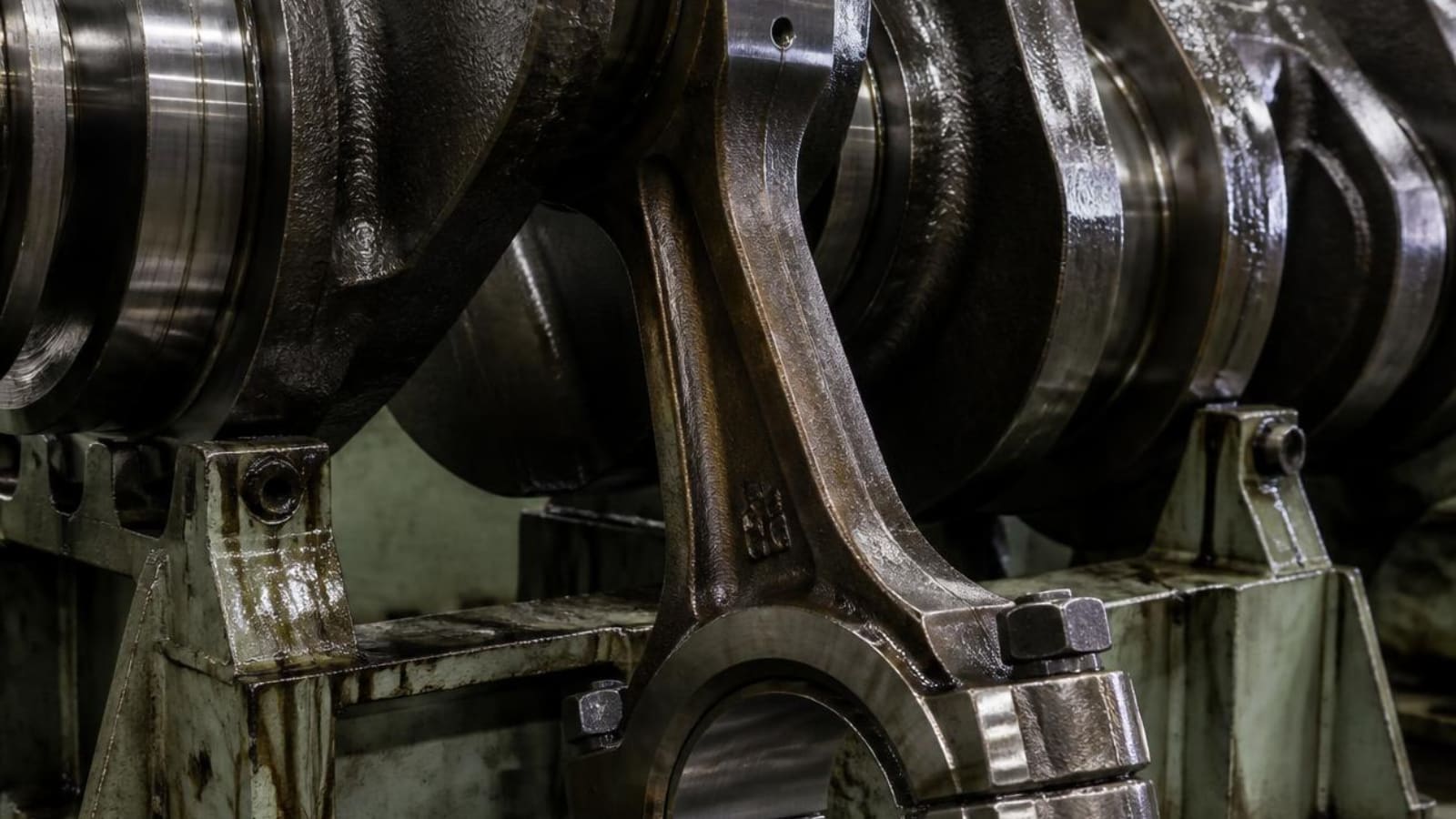 Large marine diesel engine components under overhaul